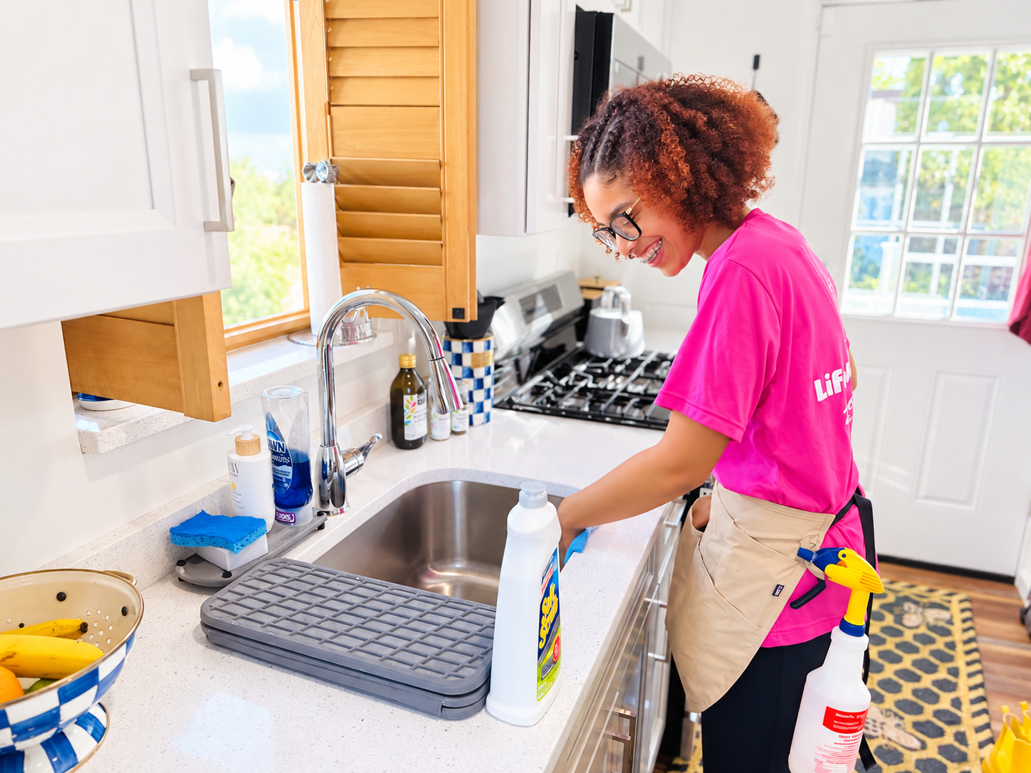Life Maid Easy cleaning technician professionally deep cleaning a kitchen sink in Philadelphia